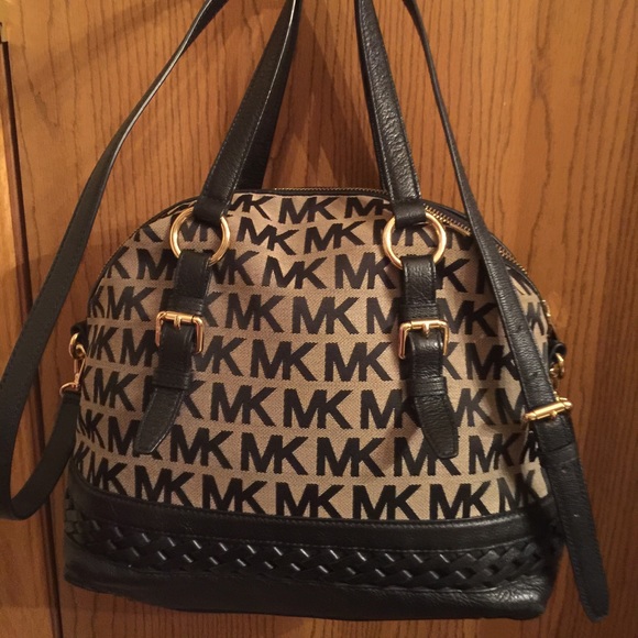 Michael Kors Handbags - FLASH SALE! authentic MK Black and Tan handbag!